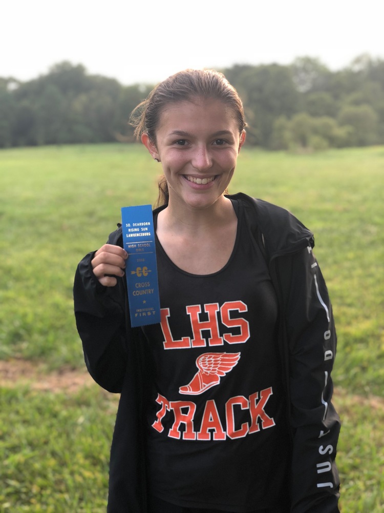 Hannah Morgan displays her 1st place ribbon from the Tigers Cross Country meet vs. South Dearborn and Rising Sun