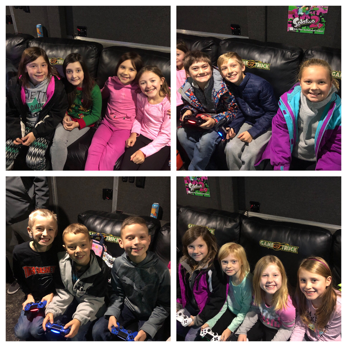 Students in game truck. 
